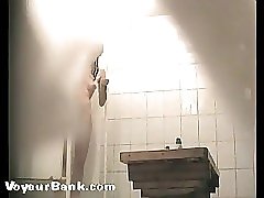 12 movies - Spying after a freshie shaving her pussy in shower Part 3