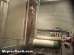 12 movies - Young slim doll getting spied after in the showers Part 1